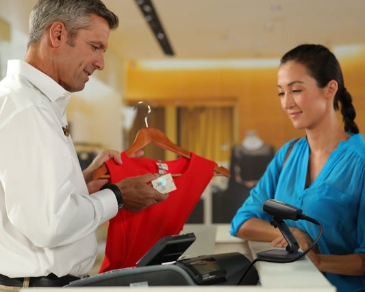 Zebra DS55 fixed-mount scanner (DS5502-SR40004ZZWW) – in use at a retail checkout