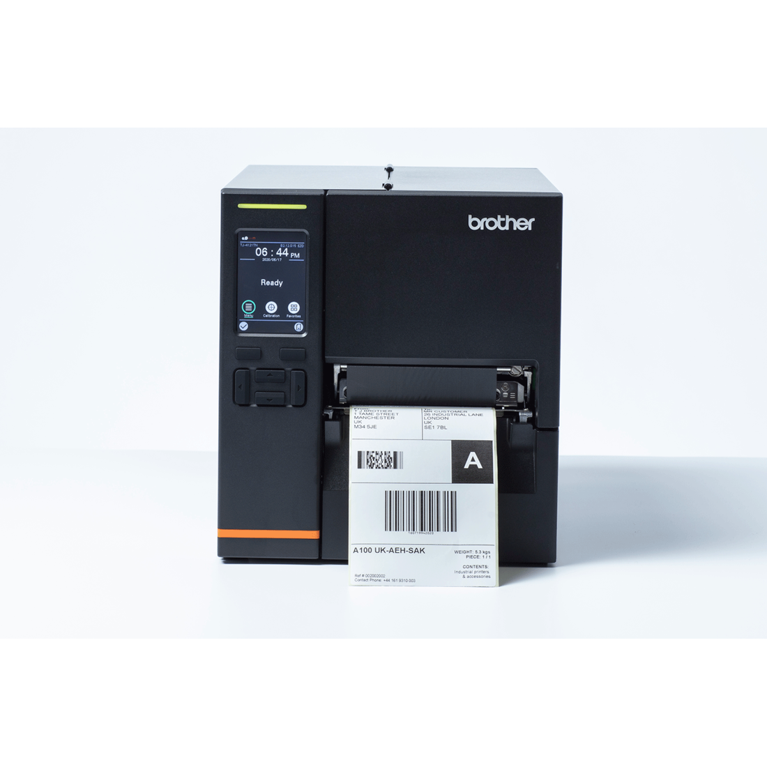 Brother TJ-4121TN industrial label printer – printing a label