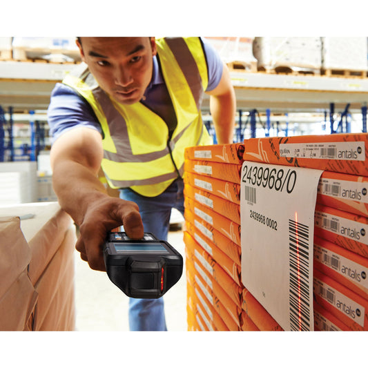 Zebra MC3300x rugged keypad mobile computer, rotating turret head, 29-key numeric keypad (MC330L-RL2EG4RW) – in use in a warehouse