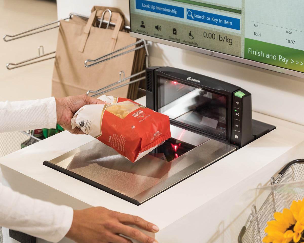 Zebra MP7200 multi-plane countertop scanner (MP7200-MNDLN000WW) – in use at a self-checkout