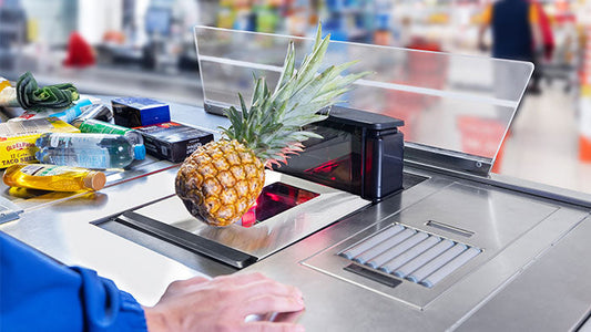 Datalogic Magellan 9550i bi-optic in-counter scanner (957022201-00361) – in use at a staffed checkout